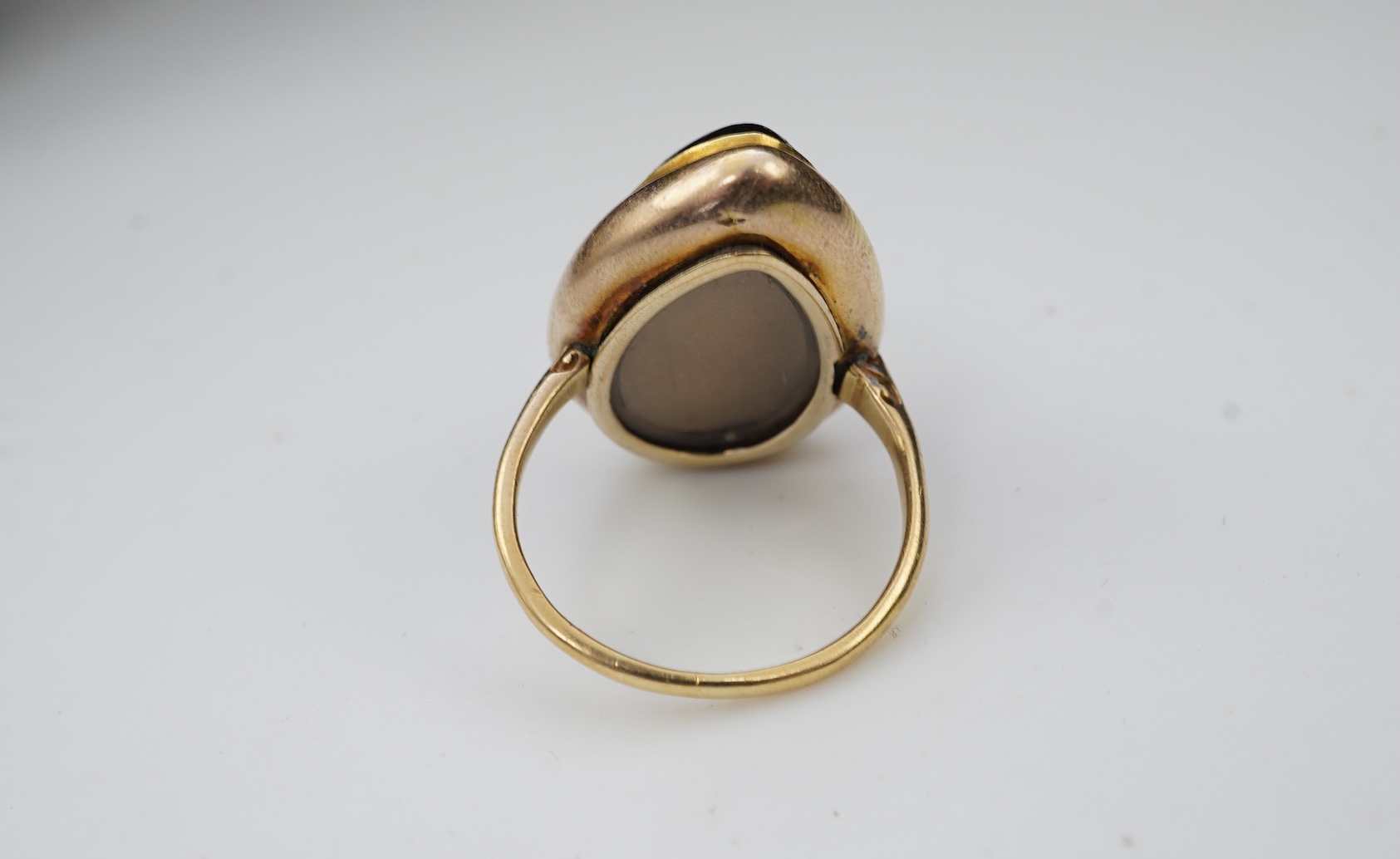 An unusual garnet locket ring, late 19th century composite